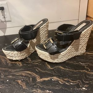 Black leather wedge sliders
